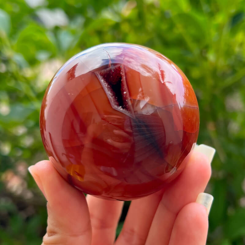 Looking for genuine and stunning Carnelian Crystal Sphere? Shop at Magic Crystals for polished cut base carnelian. We only carry 'AAA' Quality Carnelian from India and Madagascar. Red Agate Crystal Tower for reiki Healing. Free Standing Crystal, Beautiful Display Crystal with FREE SHIPPING AVAILABLE.