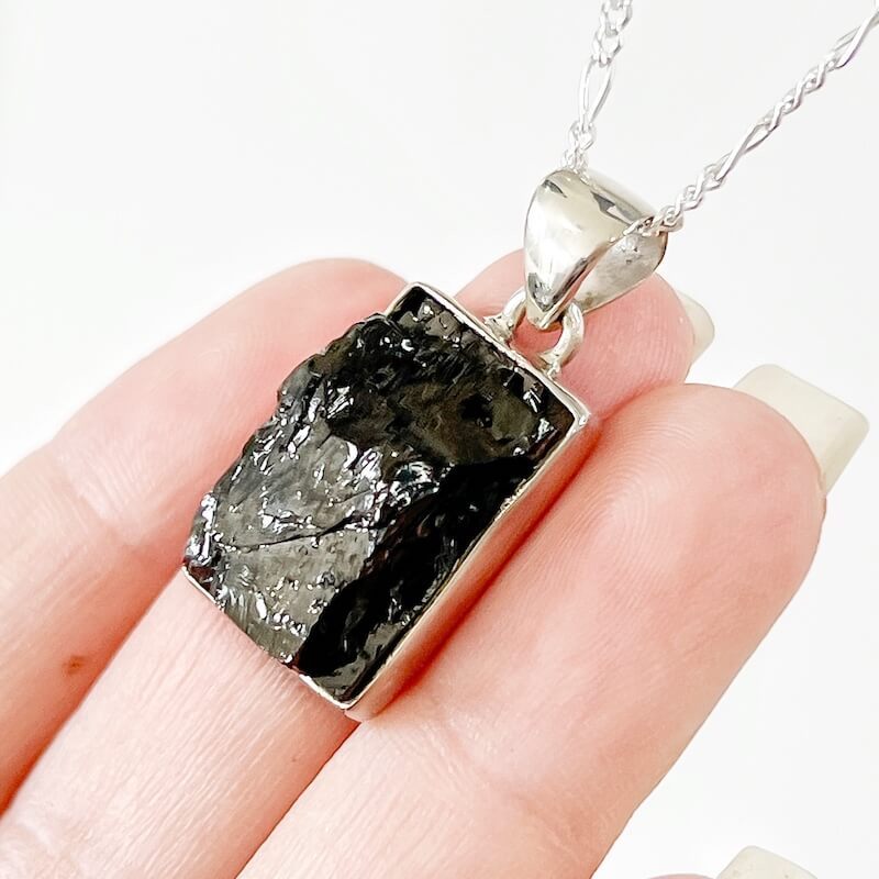 Elite-Shungite-Sterling-Silver-Necklace-X. Shop for Elite Silver Noble Raw Shungite 925 Sterling Silver Bail Pendant Necklace. Noble Shungite Necklace. Sterling Silver Shungite Necklace at magic crystals. Genuine Shungite stones. Chakra Stones, Spiritual Stone. Chakra Healing Stone. free shipping available. Block EMF's WIFI Radiation 5G.