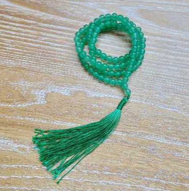 Shop beautiful hand crafted Natural Gemstone Mala Necklace - Prayer Beads at Magic Crystals. High quality Prayer Beads, Including Lapis Lazuli, Larvikite, Snowflake Obsidian, Howlite, Black Agate, Picture Jasper, Red Jasper, and Amethyst. Handcrafted with 108 beads, can be worn as a necklace or bracelet.