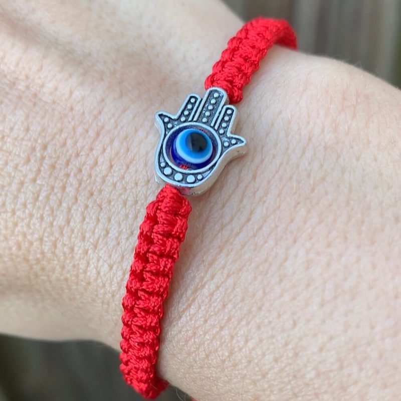 Hamsa-Eye--Bracelet.Shop at Magic Crystals for Protection. The Red String Bracelet has been worn throughout history in many cultures as a symbol of protection, faith, and good luck and acts as a shield from negativity and actually has many positive effects. In quite a few cultures a red string bracelet is believed to have magical powers. Seed-Of-Life-Bracelet-Red-String-protection-bracelet