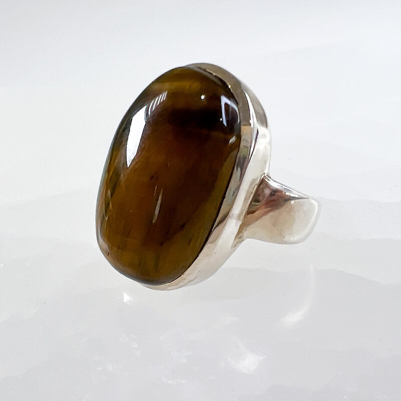 Tiger Eye Stone Sterling Silver Ring - Tiger Eye Jewelry from MagicCrystals. High quality yellow tiger eye ring. Find a wide variety of yellow tiger eye jewelry. Handmade Tiger eye pieces for mother's day, Christmas, halloween, gift.