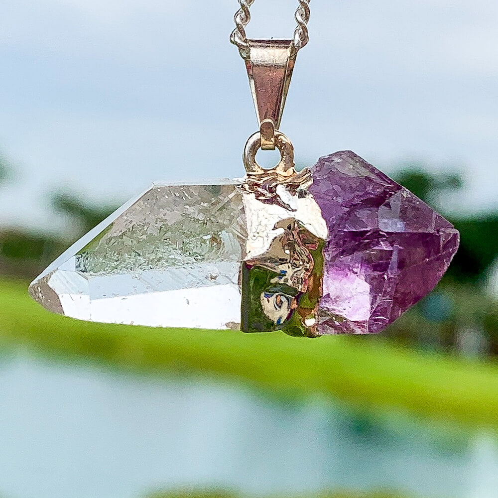 Raw Amethyst and Clear Quartz Pendant Crystal Necklace. spirituality amplifier necklace. Looking for Amethyst necklaces? Amethyst Jewelry? Find quality Amethyst gemstone when you shop at Magic Crystals. Amethyst is a solar plexus chakra stone used metaphysically to increase, magnify and clarify personal power and energy