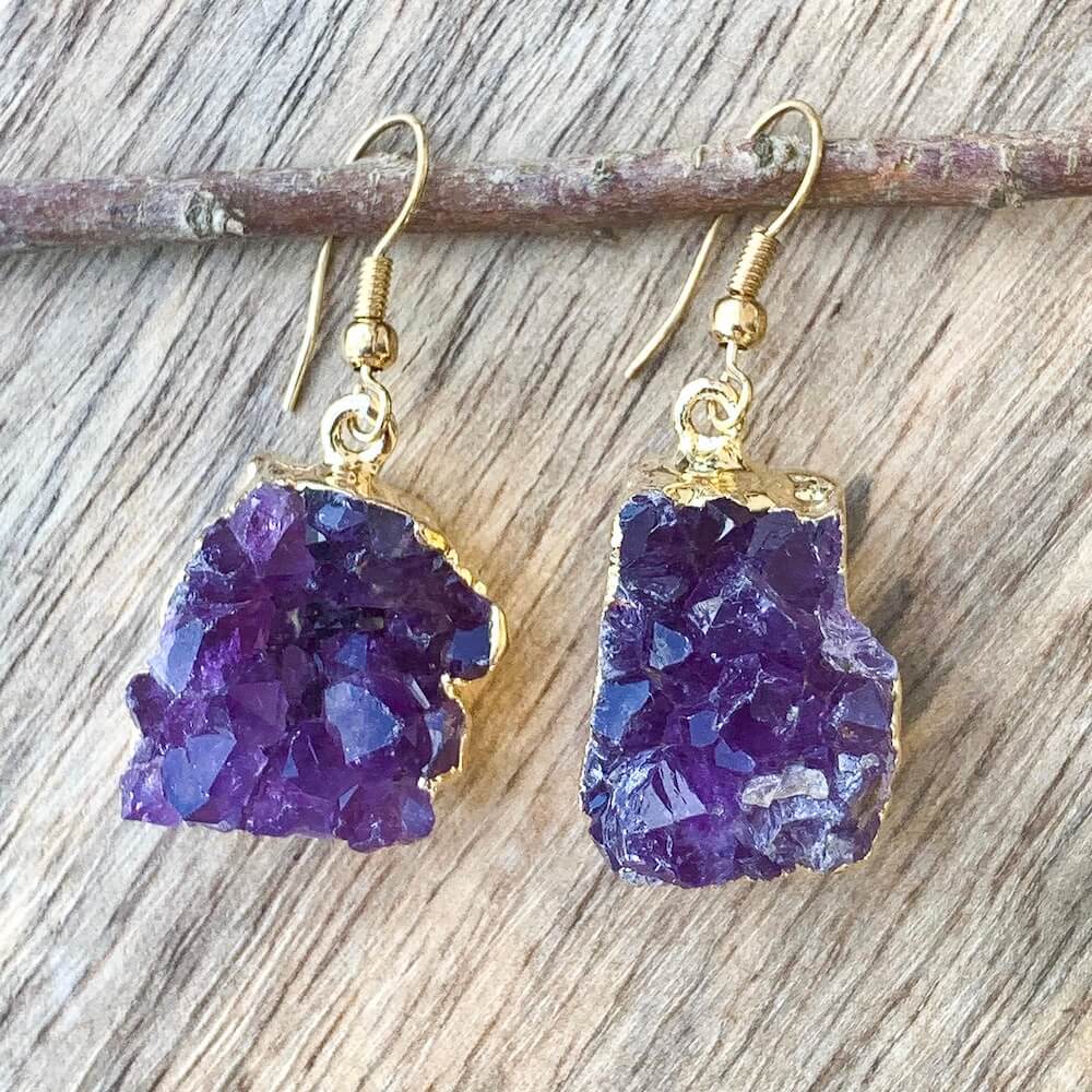 Shop for beautiful Natural Raw Amethyst Dangling Earrings, Golden Druzy Amethyst at magic crystals. magiccrystals.com offer excellent choice for women. available with FREE SHIPPING and in gold. Find a Gold Amethyst Earring or Gold Amethyst Earring when you shop at Magic Crystals. February birthstone.