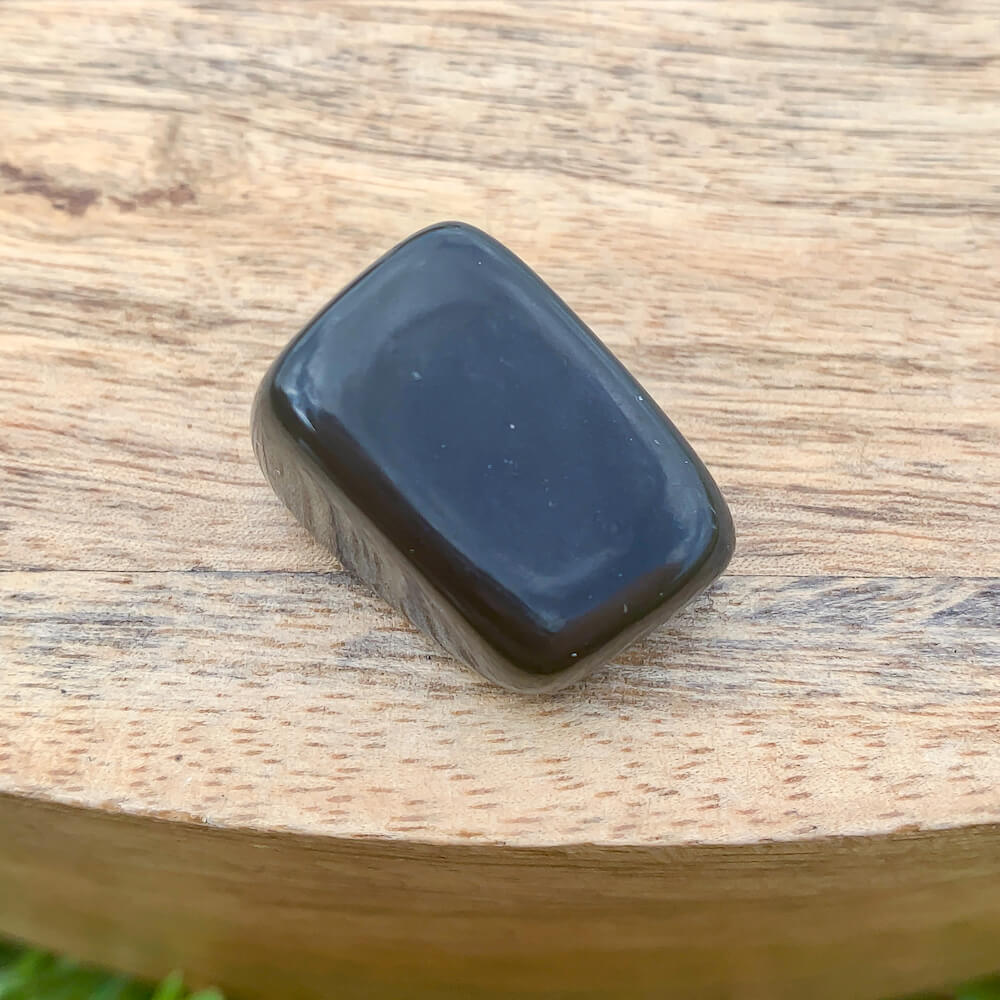 Looking for Black Obsidian? Enjoy FREE SHIPPING at Magic Crystals when you are looking for Black Obsidian TUMBLED MEDIUM - Tumbled Black Obsidian - Grounding Protection - Root Chakra - Base Chakra for Energy Healing. Black Obsidian is a very protective stone and is excellent for removing negativity.