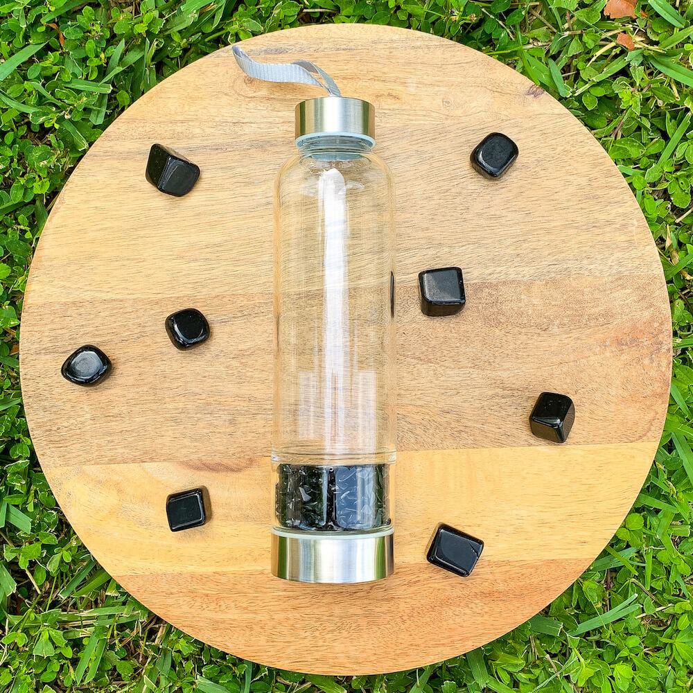 Black-Onyx-Gemstone. Looking for Authentic Tumbled Crystal Water Bottle | Glass and Stainless Steel Water Bottle? Shop at Magic Crystals for Crystal Bottle, Stone Infused, Elixir, Stainless Steel and Environmentally Friendly bottle. 400 - 500 ml Tumbled Gemstone Unique Mineral Collection Gift. Gem Elixir Water Bottle.