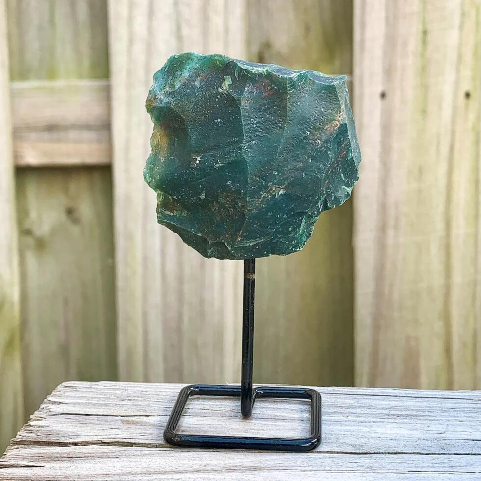 Shop from Magic Crystals One Bloodstone Rough Druzy Bloodstone Metal Stand, Bloodstone Chunk on Stand, Point on Stand Pin, Bloodstone Protect Stone, Rough Bloodstone, Raw Bloodstone! We carry a wide variety of clear quartz gemstones, Bloodstone, and quartz specimens. FREE SHIPPING AVAILABLE.