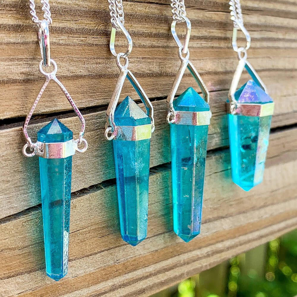 Looking for Blue Aura Points, Blue Quartz Double Point? Shop at Magic Crystals for a variety of Blue Aura Quartz Crystal Necklace - Sterling Silver Healing Gemstone Aura Quartz Necklace, Blue Aura Quartz Pendant, Healing Jewelry. Raw Blue Aura Quartz Crystal Necklace, Raw Crystal Point Pendant, Necklace for Men Women
