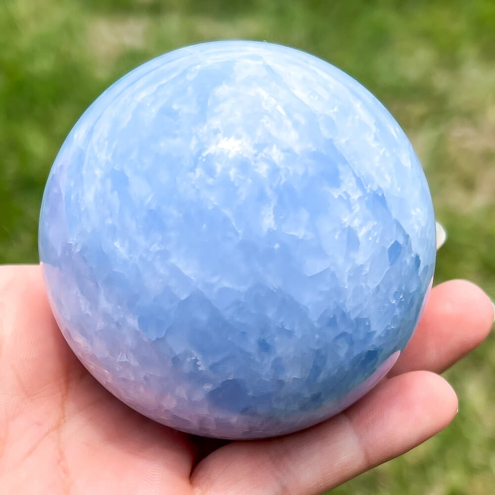 Looking for a Blue Calcite Sphere? Find a Beautiful Extra Large Blue Calcite Sphere - B at Magic Crystals for Blue Calcite Polished Carved crystal ball, Blue Calcite Stone, Blue Calcite Point, Blue Calcite Polished Ball. Blue Calcite for TRANQUILITY and HEALING. Magiccrystals.com offers the best quality gemstones.