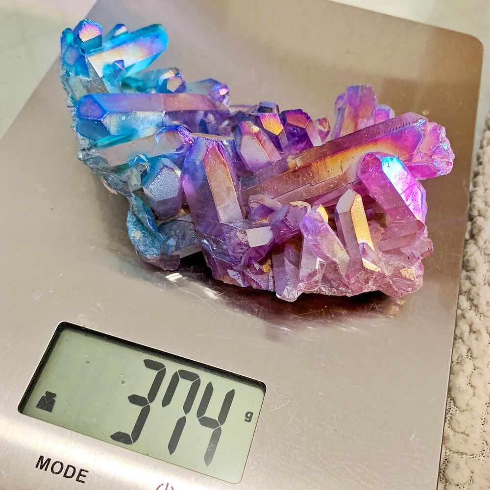 Shop for Aura Quartz cluster points. Purple Aura Crystal Point Aura Stone Flashy Rainbow Aura Crystal Point at Magic Crystals. Blue Aqua Aura & Purple Aura Quartz Cluster 374 grams at magiccrystals.com are Clear Quartz bonded with Platinum which results in a lovely raspberry rose, blue, and a purple metallic sheen.