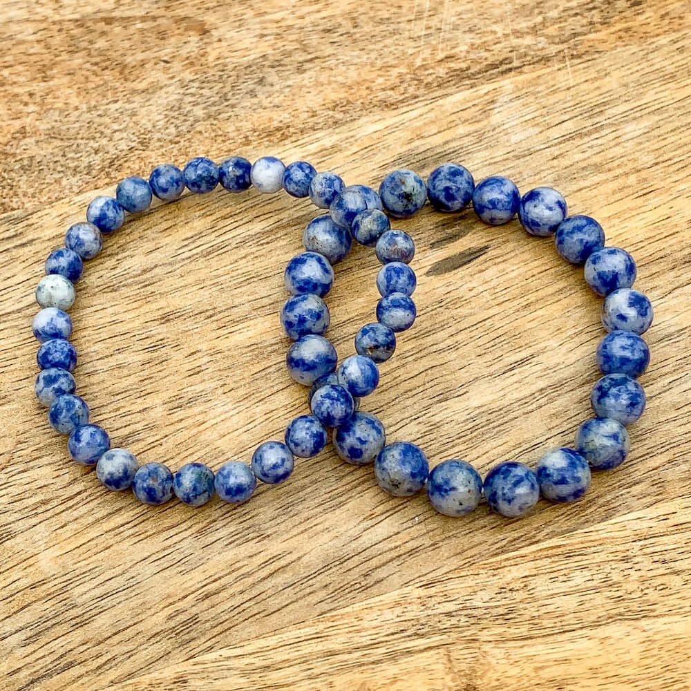 Looking for a Blue Spot Jasper bracelet? Shop at Magic Crystals for the best quality Blue Spot Jasper jewelry. We have 8 mm and 6mm Round Bracelet Stretchy String bracelets for men and women. Healing Crystal Bracelet, Gemstone Bracelets, Bracelets for Women, Fathers Day and Mothers Day Gift, Reiki Jewelry.