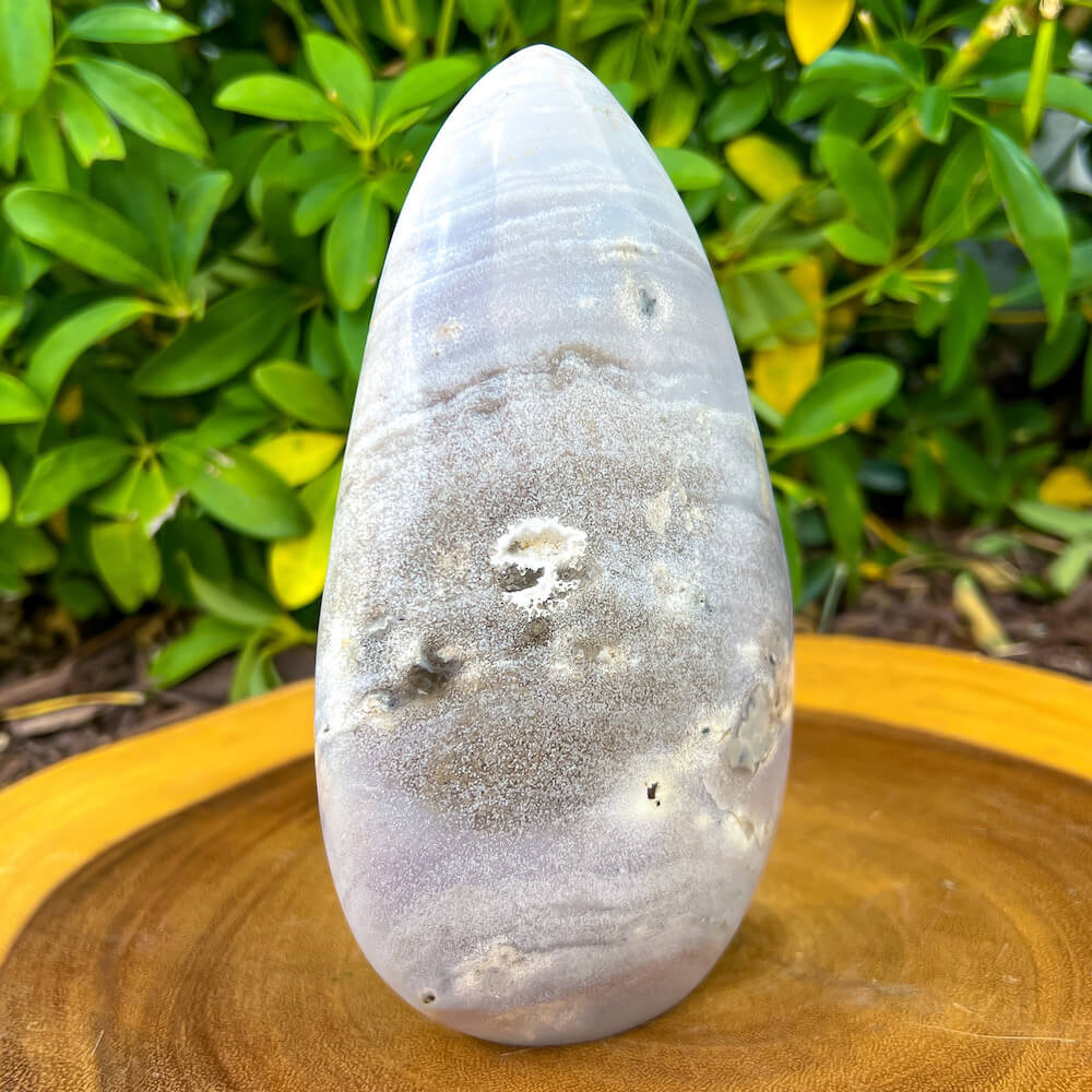 Agate and Quartz Freeform, Blue Agate, a polished Quartz at Magic Crystals. Natural Blue Lace,Slice Slab Agate. Blue Lace Agate, also known as a healing stone, with a soft, cooling and calming energy. Helps bring peace of mind. Facilitates free expression of thoughts and feelings. Helps neutralize feelings of angers.