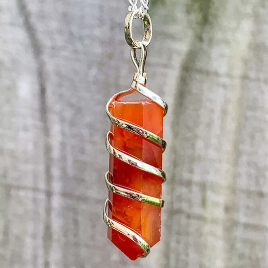 Buy Orange Carnelian Necklace - Carnelian Gemstone Jewelry, Natural Carnelian Gemstone Single-Terminated Gemstone Points wrapped at Magic Crystals. Shop for carnelian jewelry with FREE SHIPPING AVAILABLE. Carnelian is best for Motivation. Spiral Wire Wrapped necklace. Wire-wrapped Carnelian Stone Necklace.
