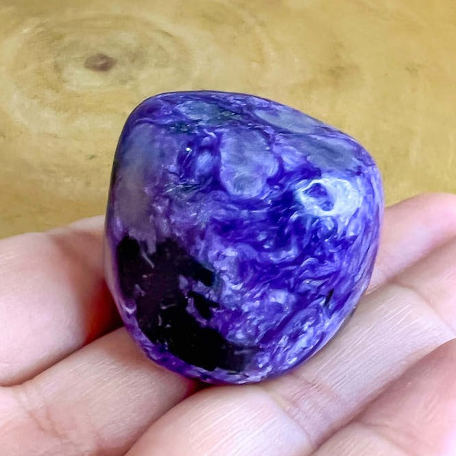 Charoite "Stone of The Dragon" stone from Russia. High Quality, Russian Natural Purple Stone, Polished Crystal. Charoite is known as a soul stone that can provide strong physical and emotional healing energies. FREE SHIPPING available. Natural Russian Charoite. Charoite Tumbled Stones from Russia, Polished Charoite.