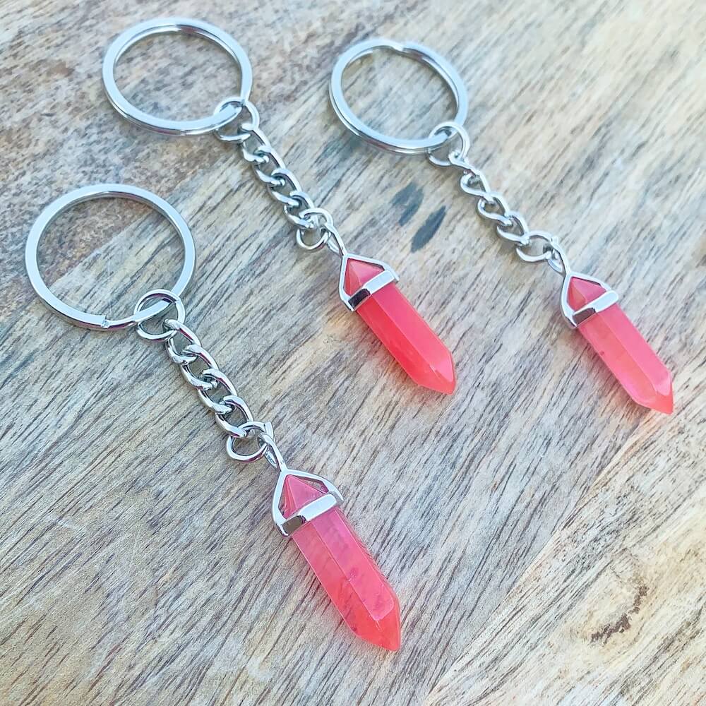 Cherry Quartz KEYCHAIN. Shop at Magic Crystals for Crystal Keychain, Pet Collar Charm, Bag Accessory, natural stone, crystal on the go, keychain charm, gift for her and him. FREE SHIPPING available. Cherry Quartz Crystal Key Chain, Crystal Keyring, Cherry Quartz Crystal Key Holder.