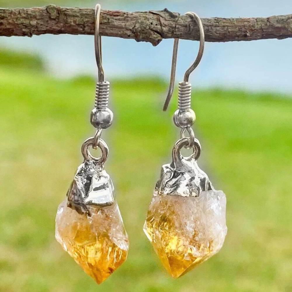 Check out our CITRINE Earrings - Birthstone, Raw Stone Jewelry, Dangle Earrings, Healing Crystals, Silver Earrings when you shop at Magic Crystals. What is Citrine? Citrine is a mineral, member of the Quartz family. Citrine Crystal meaning is ABUNDANCE and MOTIVATION. Citrine stone benefits and more.