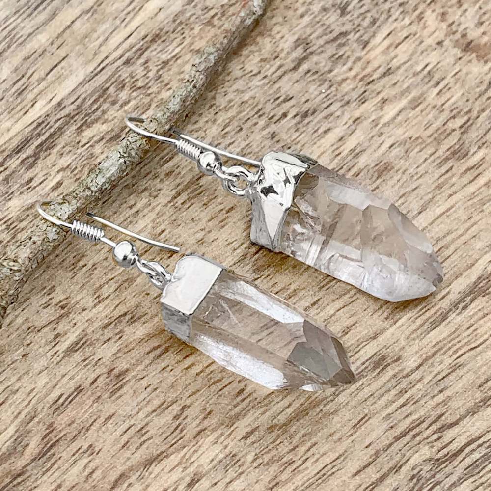 Looking for clear quartz jewelry? Well look no further! Shop at Magic Crystals for the best clear quartz quality available. We carry a wide variety of clear Clear Quartz Earrings, Raw Jewelry, Dangle Earrings with FREE SHIPPING available. Check out magiccrystals.com - Silver Jewelry - magiccrystals.com
