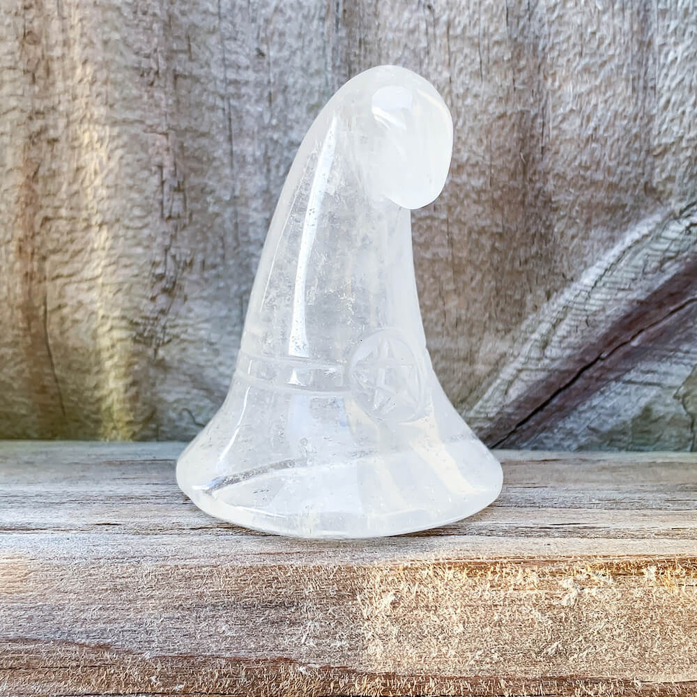 Clear-Quartz Witch-Hat. Looking for Carved Gemstone? Shop at Magic Crystals for Beautiful Crystal Witch Caps made of genuine Fluorite, Opalite, Amethyst, Clear Quartz, Black Obsidian. Gemstone Hand Carved Wizard Magic Hat Statue Decoration, Reiki Healing Quartz Sculpture, Powwow Hat. Home Decor. Gemstone 2" - Witches Hat.