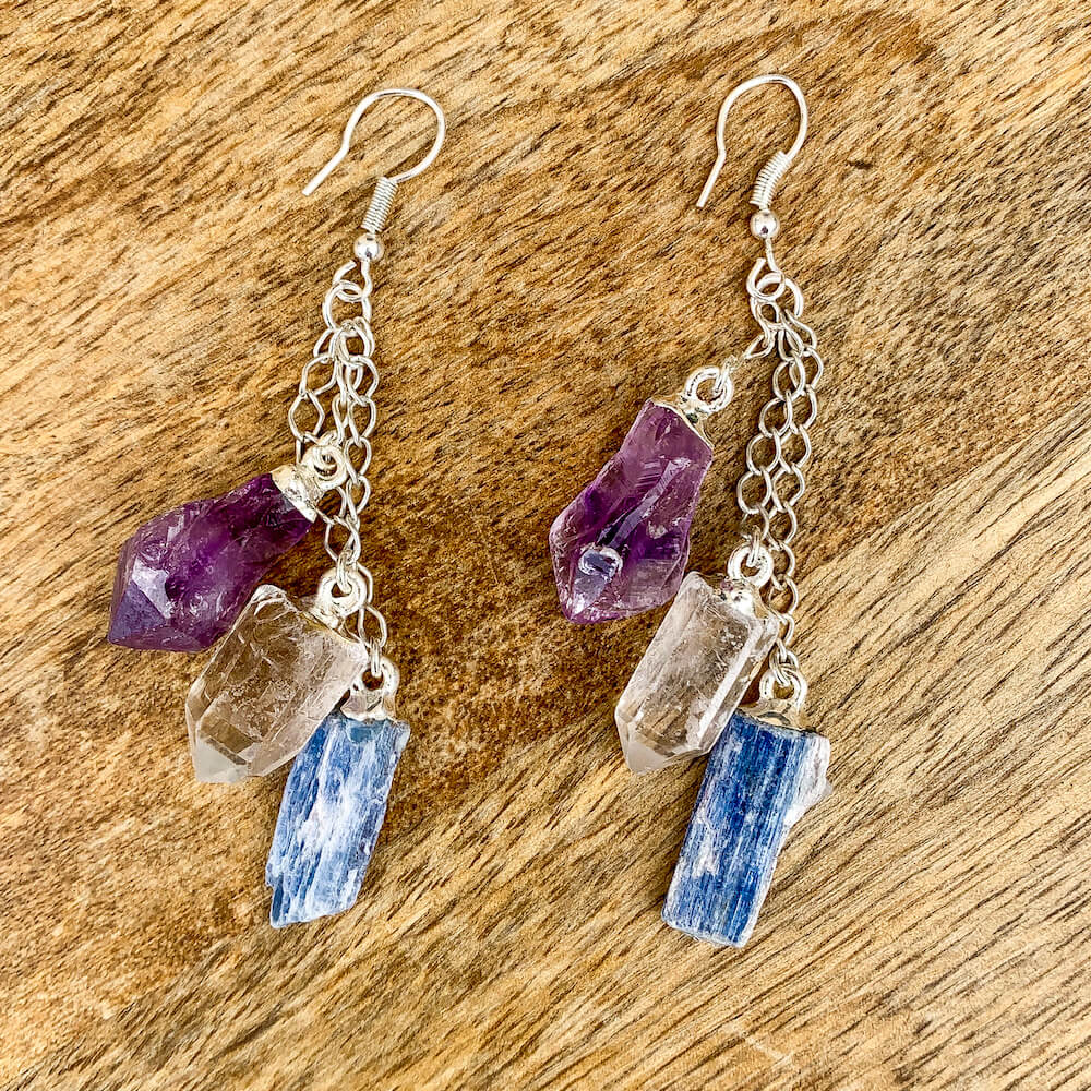 Looking for raw earrings jewelry? Shop at Magic Crystals for a perfect mix of Clear Quartz, Amethyst, Kyanite Dangle stones. We carry the best gemstone quality available. We carry a wide variety of clear Clear Quartz Earrings, boho jewelry, Dangle Earrings, jewelry for men, women, unisex with FREE SHIPPING available.