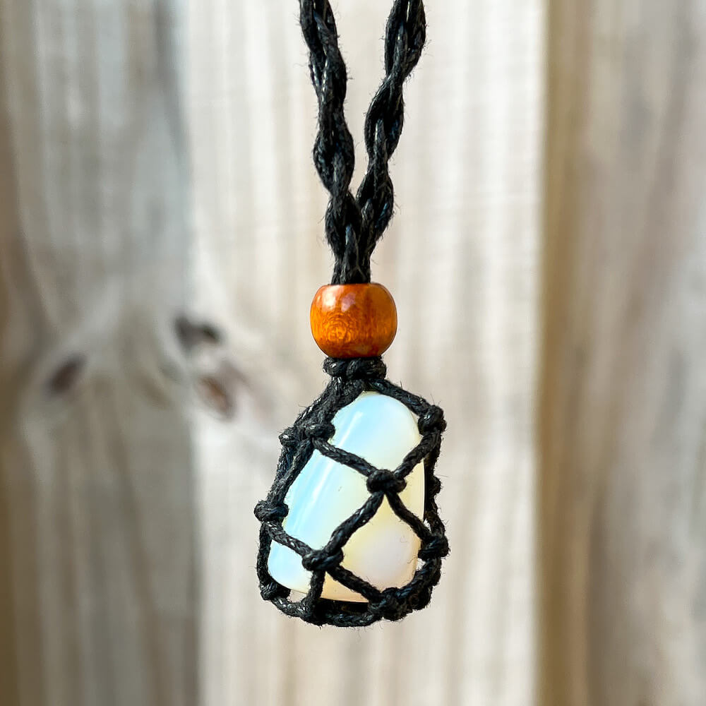 Looking for what to do with tumbled stones? Shop at Magic Crystals for our Crystal Holder Adjustable Necklace. Crystal Holder Macrame Cage Necklace - Interchangeable Stone at www.magiccrystals.com Natural Stone with Macrame Cord Pouch Necklace. stone in an adjustable necklace. FREE SHIPPING AVAILABLE.