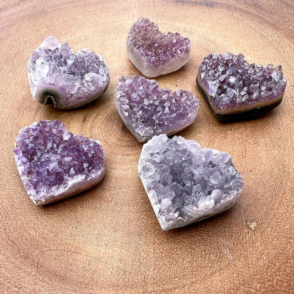 Buy Raw Amethyst Druzy Heart Stone, Amethyst Crystal, Natural Crystal at Magic Crystals. This gemstone is a February Birthstone perfect for Third Eye Chakra and Crown. Druzy Amethyst Heart, 1 piece. crystal cluster. purple stone heart and heart-shaped polished gem. Perfect for Christmas gift and valentines day present.