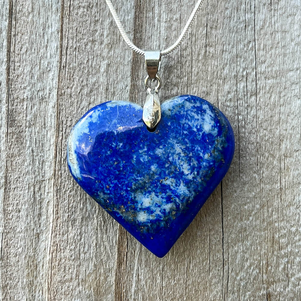 Check out our Lapis Lazuli Heart Necklace - Lapis Lazuli Jewelry from Afghanistan for the very best in unique, handmade pieces from Magic Crystals. Lapis Lazuli heart necklace, Throat & Third Eye Chakra healing Lapis Lazuli pendant, Healing Crystal Lapis Lazuli Jewelry, Natural stones necklace, Crystal Necklace.