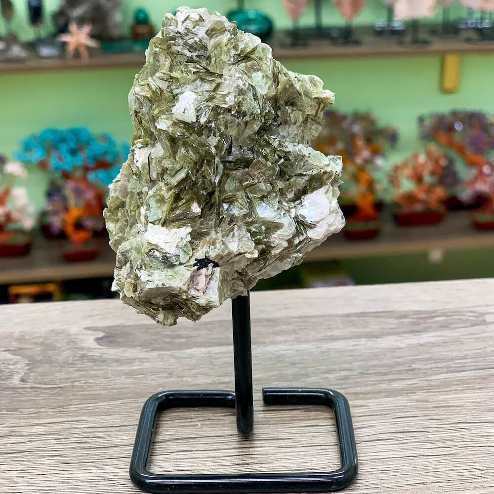 Shop from Magic Crystals One Gold Mica Rough Druzy. Gold Mica Metal Stand, Gold Mica Chunk on Stand, Point on Stand Pin, Gold Mica Protect Stone, Rough Gold Mica, Raw Gold Mica! We carry a wide variety of clear quartz gemstones, Gold Mica, and quartz specimens. FREE SHIPPING AVAILABLE.