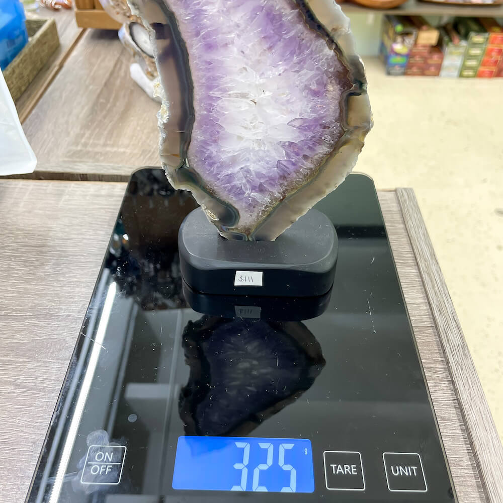 Buy Magic Crystals Druzy Amethyst Slice On a Stand #B, Amethyst Stone, Amethyst Stone, Purple Amethyst Point, Stone Point, Crystal Point, Amethyst Tower, Power Point at Magic Crystals. Natural Amethyst Gemstone for PROTECTION, PEACE, INSPIRATION. Magiccrystals.com offers FREE SHIPPING and the best quality gemstones.