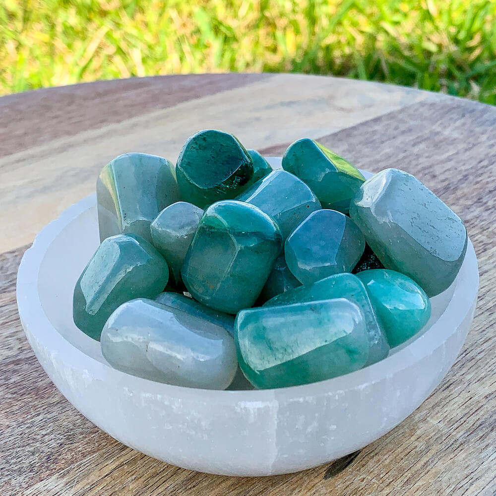 Buy Green Aventurine Tumbled Stones, Green Aventurine Polished Gemstones, Bulk Crystals at Magic Crystals. Green Aventurine TUMBLED. Green Aventurine for Heart Chakra, 4th Chakra helps with Abundance, Reiki, and Energy Healing. Green Aventurine is energizing, carries the energy of luck, and prosperity. FREE SHIPPING