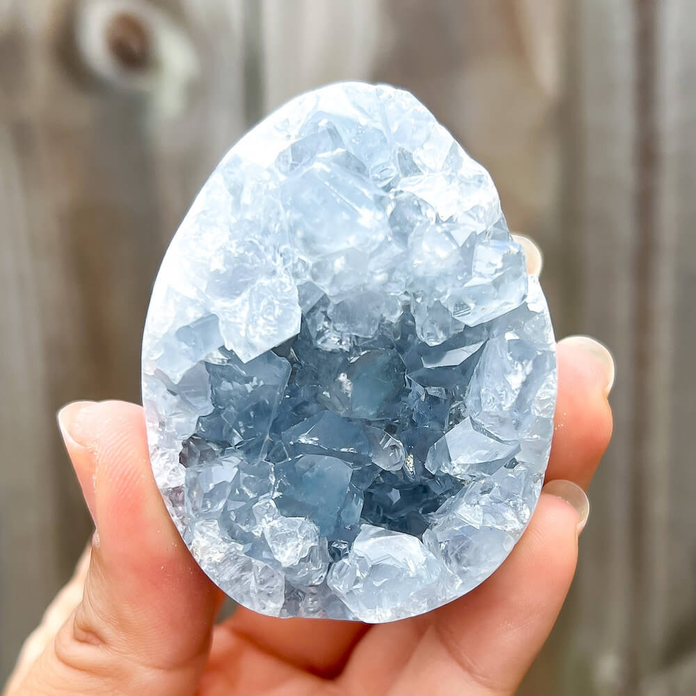 Looking for Celestite Stone Egg - Celestite Raw Crystal Cluster? Magic Crystals carries genuine Celestite from Madagascar. Natural, pale icy blue celestite. Large Celestite Crystal Geode | Celestite Crystal on a stand | Madagascar Celestite | Celestite Crystal Cluster | Celestite Crystal.