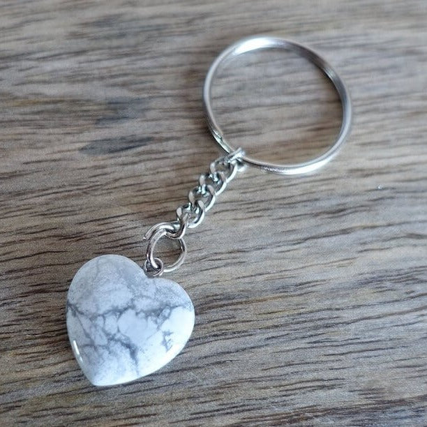 Howlite keychain. Shop at Magic Crystals for Crystal Keychain, Pet Collar Charm, Bag Accessory, natural stone, crystal on the go, keychain charm, gift for her and him. Howlite is a great for vitality. Howlite Natural Stone Keychain, Crystal Keychain, Howlite Crystal Key Holder. White gemstone.
