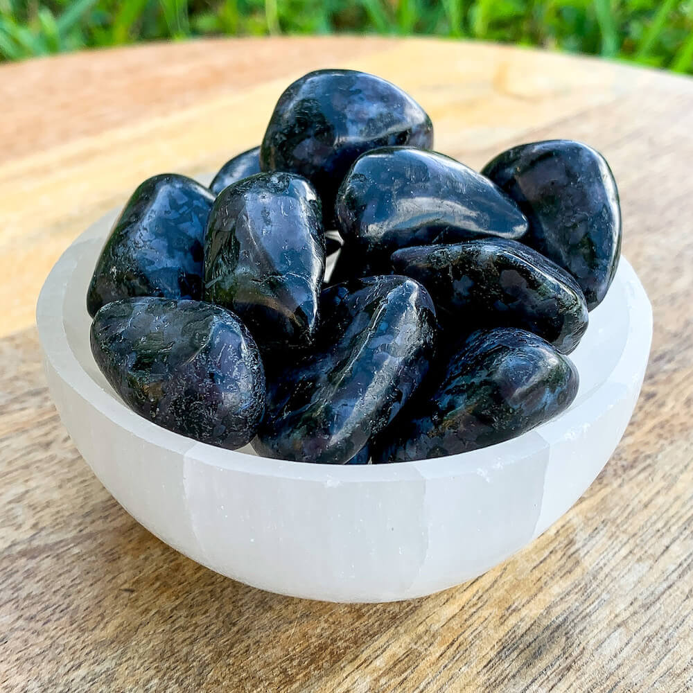 Looking for Indigo Gabbro Tumbled Stone? Shop for Mystic Merlinite, Indigo Gabbro Tumbled Stones, Pocket Stone, Natural, Polished at Magic crystals. Mystic Merlinite is one of the newest meditation tools we all should have with us. FREE SHIPPING available.