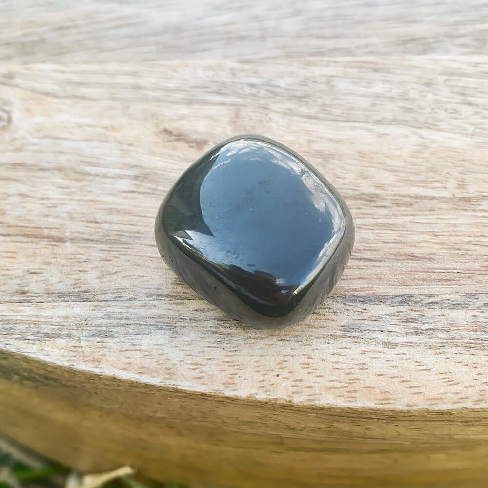 Buy Black Jet Tumbled Stones | Jet Polished Gemstones | Bulk Crystals. Jet is a protective warrior stone. It helps you get out of your head and back down to earth. Jet Tumbled Stone | Gemstone Healing, Chakra Stones, Protection Crystals, Wicca, Witchcraft Crystals, Collectable Stones, Pagan tools at Magic Crystals.