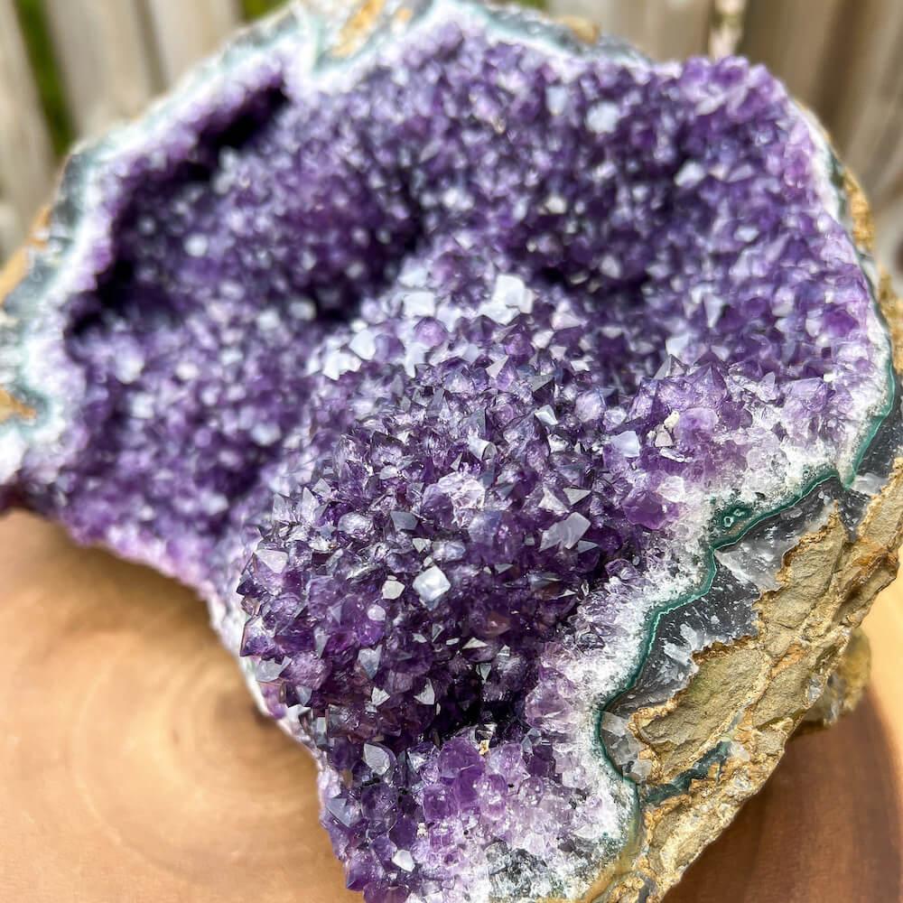 Buy Druzy Amethyst Cluster, Uruguayan Amethyst Crystal at Magic Crystals. This gemstone is a February Birthstone perfect for Third Eye Chakra and Crown. This gemstone helps for Anxiety, Spirituality, and Wisdom. Gifts at Magic Crystals. Natural Amethyst offers FREE SHIPPING and the best quality gemstones.