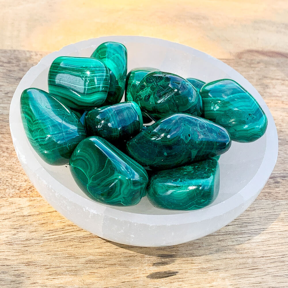 Buy Malachite Tumbled Stones | Malachite Polished Gemstones | Bulk Crystals at Magic Crystals. malachite aesthetic, malachite jewelry, malachite crystal, malachite stone, meaning, malachite crystal meaning. Malachite is known as a protection stone from lower vibrational energies and entities.