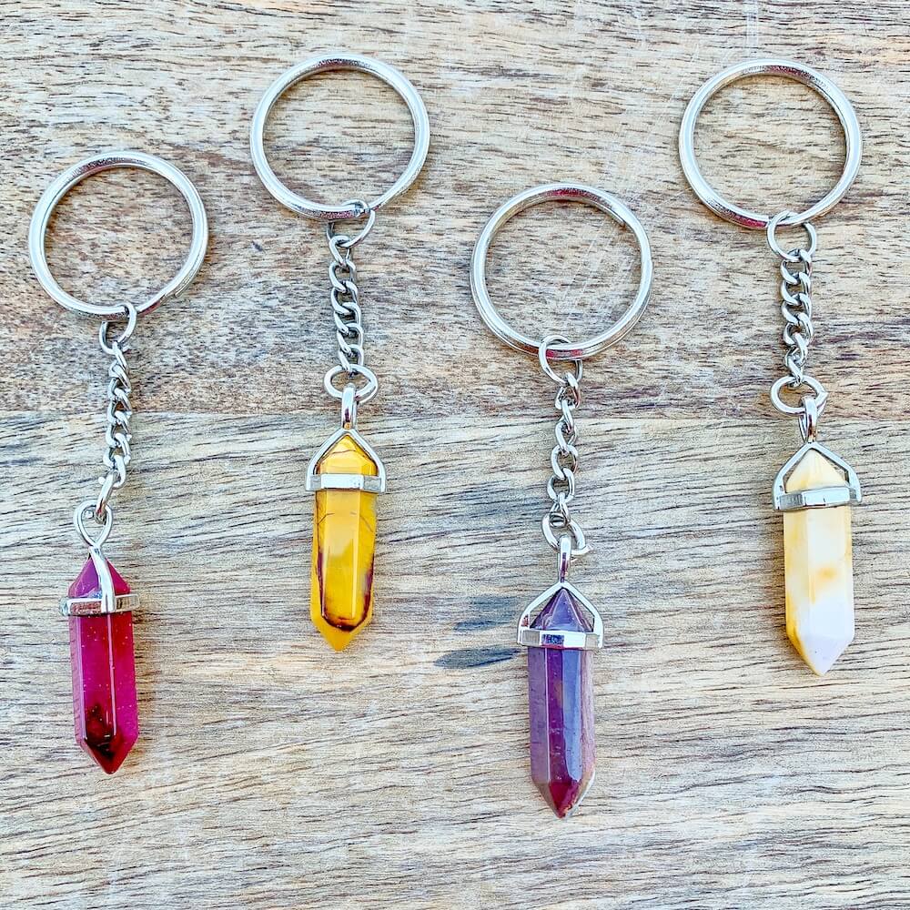 Mookaite Jasper KEYCHAIN. Shop at Magic Crystals for Crystal Keychain, Pet Collar Charm, Bag Accessory, natural stone, crystal on the go, keychain charm, gift for her and him. FREE SHIPPING available. Mookaite Jasper Crystal Key Chain, Crystal Keyring, Mookaite Jasper Crystal Key Holder.