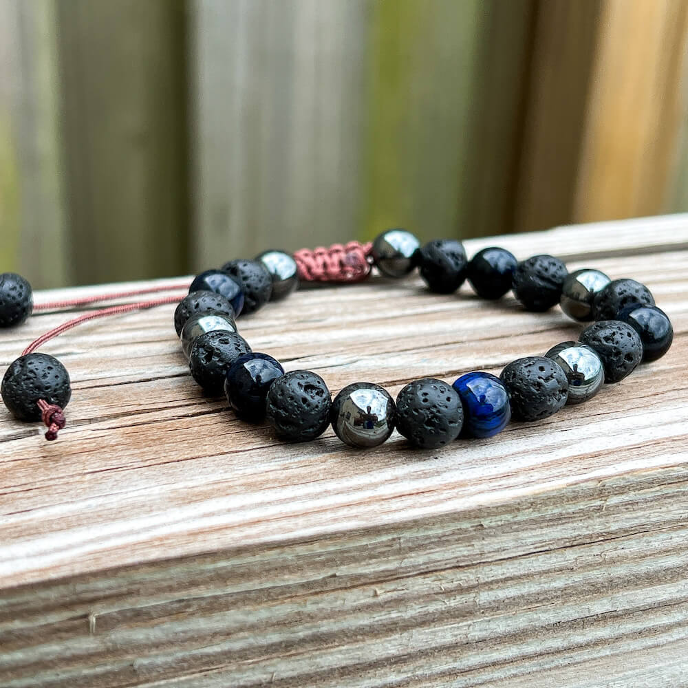 Looking for an adjustable bracelet? Shop at Magic Crystals for Blue Tiger Eye, Hematite, and Lava Stone Adjustable Bracelet. Bracelet made of natural gemstones and Lava stones for Oils Diffuser. Unisex jewelry adjustable bracelet. Color: Black, gray for Chakra: Third Eye, Solar Plexus, Sacral, Root. FREE SHIPPING