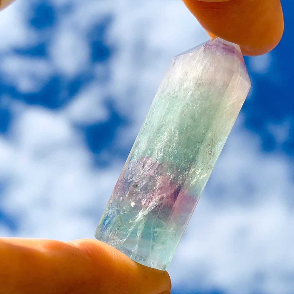 Looking for Natural Watermelon Fluorite Obelisk - Fluorite Towers? Shop at Magic Crystals for Fluorite Polished Point, Fluorite Stone, Purple Fluorite Point, Stone Point, Crystal Point, Fluorite Tower, Power Point. Natural Fluorite Gemstone for INTUITION. Magiccrystals.com offers the best quality gemstones.