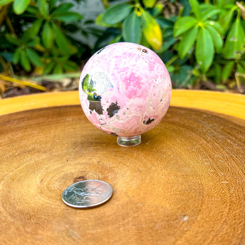 Shop for handmade Pink Rhodonite Sphere - Peruvian Rhodonite Carved Sphere at Magic Crystals. Peruvian Pink Rhodonite Carved Sphere. Rhodonite Polished Sphere Healing Crystal Gemstone. Rhodonite is a wonderfully peaceful crystal. Enjoy FREE SHIPPING when you shop at magiccrystals.com. Undrilled crystal Sphere.