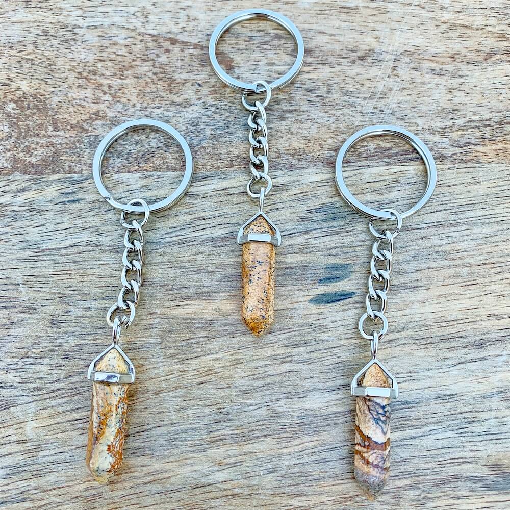 Picture Jasper KEYCHAIN. Shop at Magic Crystals for Crystal Keychain, Pet Collar Charm, Bag Accessory, natural stone, crystal on the go, keychain charm, gift for her and him. FREE SHIPPING available. Picture Jasper Crystal Key Chain, Crystal Keyring, Picture Jasper Crystal Key Holder. Purple stone keys.