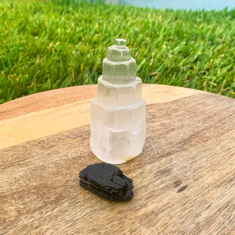 Looking for protection stones? Shop at Magic Crystals for the perfect Protection Bundle. Raw Selenite Tower and Black Tourmaline Raw help you CLEARING • PROTECTION • SHIELDING your sacred space. Whether it is your home or office. Selenite activates the third eye and Black Tourmaline is meditation crystals.
