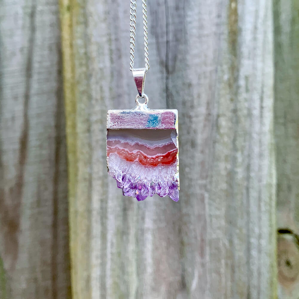 Looking for Raw sliced Amethyst Silver Plated Pendant Necklace? Shop at Magic Crystals for Amethyst Jewelry. Amethyst Stone necklaces are good for PROTECTION, PURIFICATION, and SPIRITUALITY. Raw Amethyst Slice Pendant February Birthstone Necklace Gold Filled Chain Rectangle. Purple Crystal Gift. Handmade Jewelry.