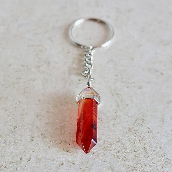 Double Point Red Agate Keychain. Red Agate keychain. Shop at Magic Crystals for Crystal Keychain, Pet Collar Charm, Bag Accessory, natural stone, crystal on the go, keychain charm, gift for her and him. Red Agate is a great LOVE. Red Agate Natural Stone Keychain, Crystal Keychain, Red Agate Crystal Key Holder. Red gemstone.