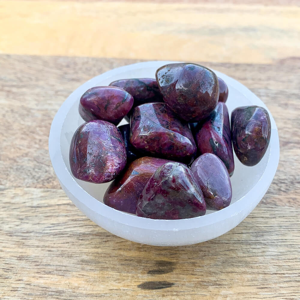 Looking for Ruby crystal - ruby stone - ruby tumbled stone - tumbled ruby - healing crystals and stones - heart chakra stone? Shop at MAGIC CRYSTALS for grade quality ruby. Ruby initiates the pleasures of life and stimulates the heart, encouraging one to enjoy being in the physical world. FREE SHIPPING AVAILABLE.