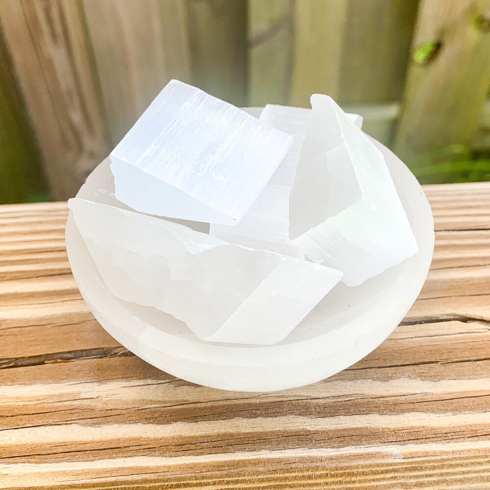 Looking for Selenite Small Chunks pieces - Gypsum - Satin Spar Selenite - Selenite Chunks - Bulk Selenite - White Selenite - Raw - Crown Chakra with Free Shipping? Shop at Magic Crystals for the polished Selenite Charging station. We have a large Heavy Crystal Plate used for Protection Cleansing Crystal Healing Chakra.