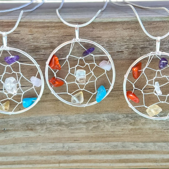 Shop our 7 Chakra Stone Necklace at Magic Crystals. We Have the Very Best Quality and Unique Gemstones Collection. Our items are Hand Crafted and Handmade with Love. This Seven Chakra Dream Catcher Silver Plated will Help you Activate your Chakras to Bring Balance and Energy into your Life. Natural and Genuine gemstones