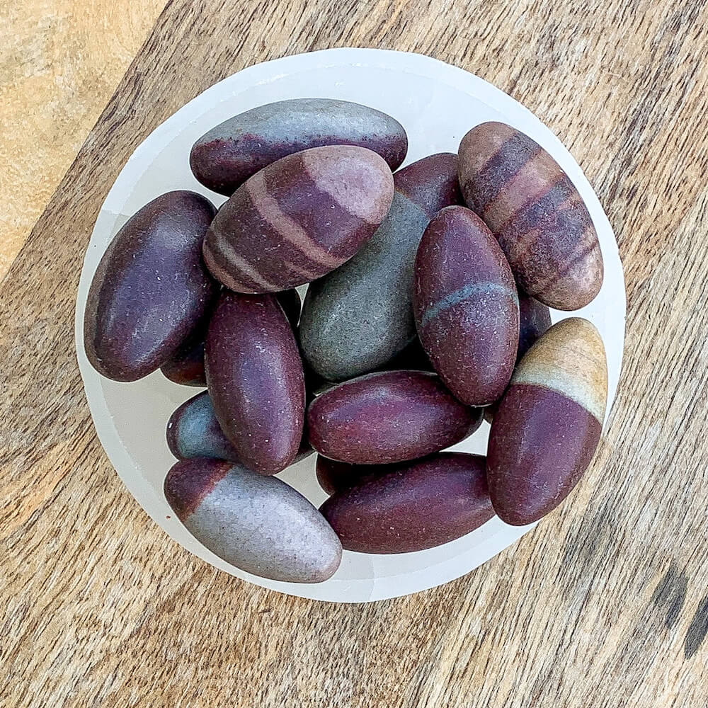 Buy Shiva Lingam Stone - Shiva Lingam Egg - healing crystals and stones when you shop at Magic crystals. Shiva Lingam Stone is a small size. healing crystals and stones from India helping to balance chakras. FREE SHIPPING available. These stones intensify the vibration within your energy system.