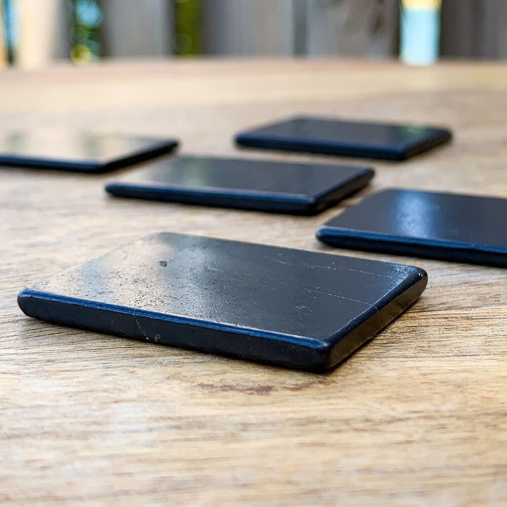 Shop for Shungite at magic crystals. Find Shungite Phone Rectangle Sticker for EMF Protection Tools at Magic Crystals. Purification, Reiki, EMF Protection.Shungite plates for cell phone Engraved images | Made of natural shungite stone various image | Shungite EMF protection shield sticker.