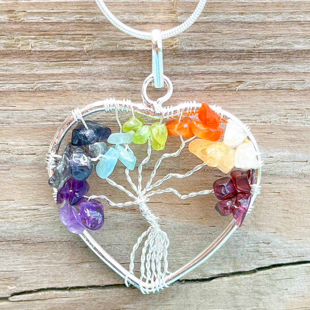 Check out our Tree of Life 7 Chakra Jewelry Wire heart Necklace when you shop at Magic Crystals. This beautiful 7 chakra necklace will help activate your Chakras to bring balance and energy into your life. Find the best seven chakra stones jewelry. FREE SHIPPING available. Chakra stones necklace for balance.