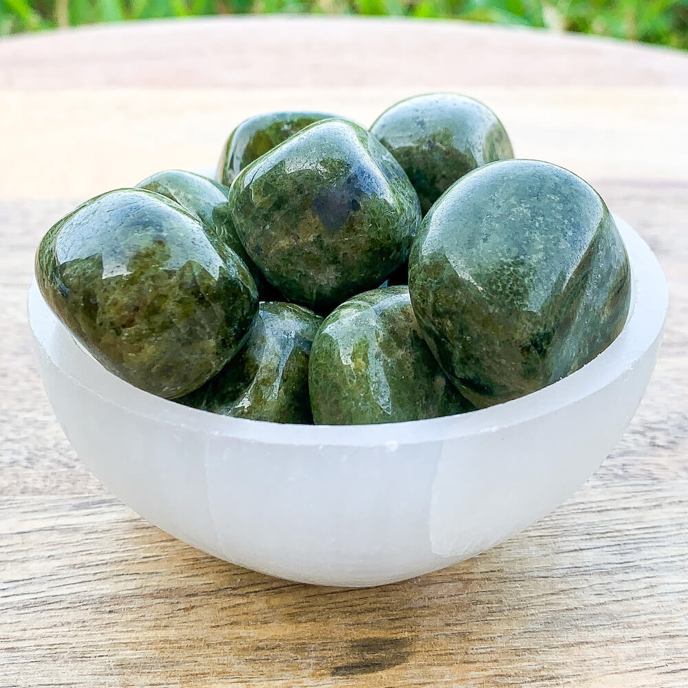 Looking for Vesuvianite Stone, Vesuvianite Idocrase Polished Stone? Shop at Magic Crystals for genuine Vesuvianite polished gemstones, Vesuvianite towers and jewelry. Vesuvianite stones meaning - Heart Chakra - Reiki - Energy Healing. Shop at magiccrystals.com green stones