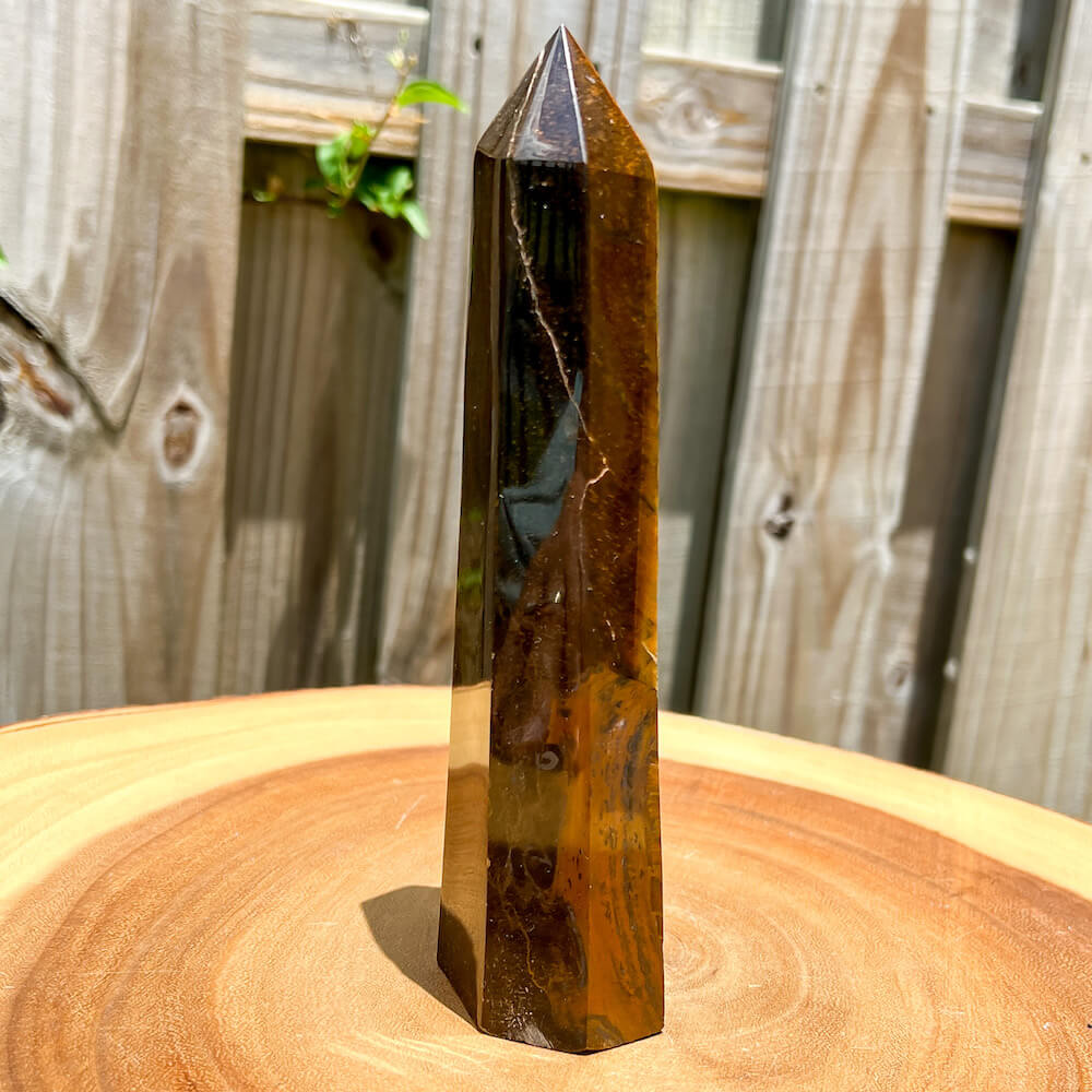 Looking for Natural Yellow Tiger Eye Obelisk? Shop at Magic Crystals for Tiger Eye Tower. Yellow Tiger Eye is a stone of protection and good luck. Natural Tiger Eye Crystal, Tiger Eye Point Wand, Generator Hexagonal Point (Reiki Healing Wand Point), Gemstone Wand.
